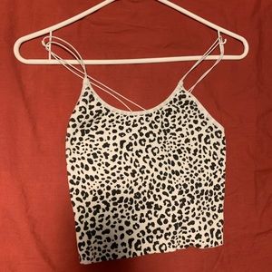 cheetah print tank top. it’s hood material and is stretchy.